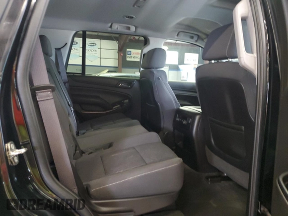 2015 Chevrolet Tahoe LS with VIN 1GNSCAKC9FR301715, listed as a Copart auction lot 64249005 with 107,240 mi miles and Clean title. Bid and sale history available at DreamBid. Image 11.