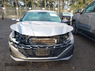 2021 Hyundai Elantra SEL z VIN 5NPLN4AG1MH012443, wystawiony jako IAAI lot #41209499 z przebiegiem 57 829 mil mil oraz . Historia ofert i sprzedaży dostępna na DreamBid. Obrazek 13.