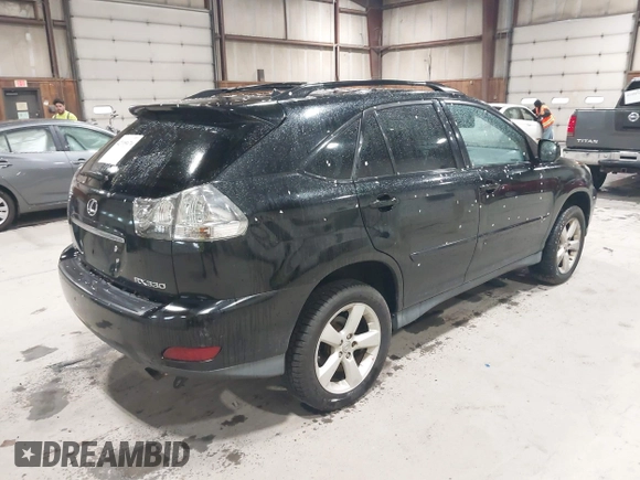 2004 Lexus RX with VIN 2T2HA31U74C036035, listed as a IAAI auction lot 42195070 with 200,689 mi miles. Bid and sale history available at carsss.com. Image 4.