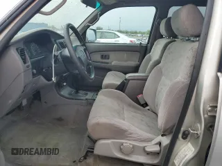 2002 Toyota 4Runner SR5 z VIN JT3GN86R220227055, wystawiony jako Copart lot #59354055 z przebiegiem 306 121 mil mil oraz Czysty tytuł • Clean title. Historia ofert i sprzedaży dostępna na DreamBid. Obrazek 7.
