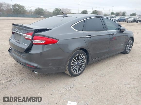 2017 Ford Fusion Titanium with VIN 3FA6P0SU8HR104727, listed as a IAAI auction lot 41242482 with 83,021 mi miles and . Bid and sale history available at DreamBid. Image 4.