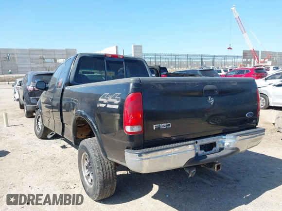 1999 Ford F-150 XL with VIN 1FTRX18L3XKA77743, listed as a IAAI auction lot 42512532 with Not provided miles and . Bid and sale history available at DreamBid. Image 3.