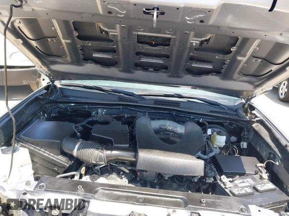 2021 Toyota Tacoma SR with VIN 3TMCZ5AN6MM393306, listed as a IAAI auction lot 42094095 with 57,217 mi miles and . Bid and sale history available at DreamBid. Image 10.