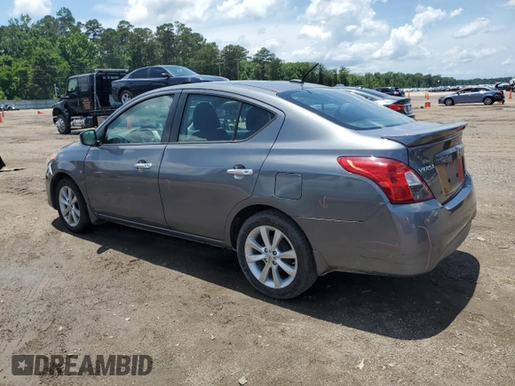 2016 Nissan Versa S with VIN 3N1CN7APXGL854562, listed as a Copart auction lot 60080515 with 156,360 mi miles and Salvage title. Bid and sale history available at DreamBid. Image 2.