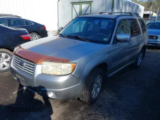 2007 Subaru Forester X w/Premium Pkg with VIN JF1SG65697H729488, listed as a IAAI auction lot 41567326 with 209,961 mi miles. Bid and sale history available at carsss.com. Image 2.