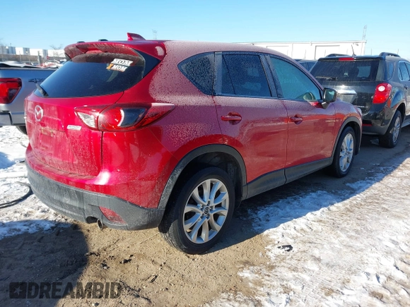 2015 Mazda CX-5 Grand Touring with VIN JM3KE4DY0F0538246, listed as a IAAI auction lot 41629662 with 87,788 mi miles. Bid and sale history available at carsss.com. Image 4.