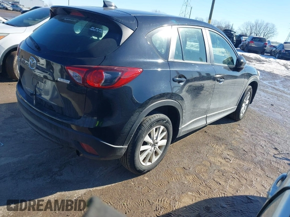 2014 Mazda CX-5 Sport with VIN JM3KE2BE7E0313978, listed as a IAAI auction lot 41437144 with 161,181 mi miles and . Bid and sale history available at carsss.com. Image 4.