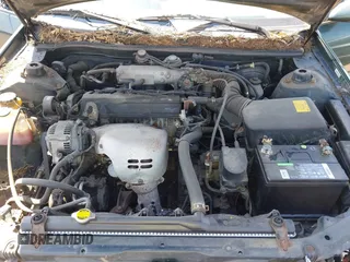 2000 Toyota Camry CE z VIN 4T1BG22K9YU931157, wystawiony jako IAAI lot #42370152 z przebiegiem 222 721 mil mil oraz . Historia ofert i sprzedaży dostępna na DreamBid. Obrazek 10.