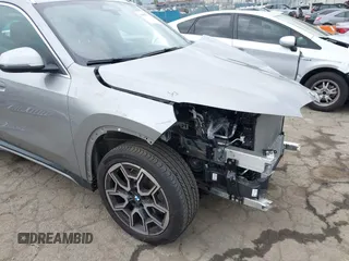 2023 BMW X1 xDrive28i with VIN WBX73EF02P5Y08733, listed as a IAAI auction lot 41901171 with 13,684 mi miles and . Bid and sale history available at DreamBid. Image 18.