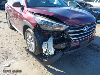 2017 Hyundai Tucson SE Plus with VIN KM8J33A45HU391175, listed as a IAAI auction lot 41803304 with 70,784 mi miles. Bid and sale history available at carsss.com. Image 6.