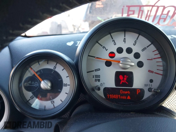 2013 MINI Convertible S with VIN WMWZP3C55DT705938, listed as a IAAI auction lot 41372294 with 118,481 mi miles and . Bid and sale history available at DreamBid. Image 7.
