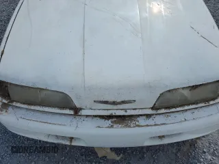 1993 Ford Thunderbird LX z VIN 1FAPP62T6PH189176, wystawiony jako Copart lot #78146094 z przebiegiem 107 514 mil mil oraz Szkoda całkowita • Salvage title. Historia ofert i sprzedaży dostępna na DreamBid. Obrazek 11.