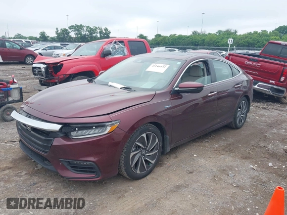 2020 Honda Insight Touring z VIN 19XZE4F93LE010040, wystawiony jako IAAI lot #42240572 z przebiegiem 52 299 mil mil oraz . Historia ofert i sprzedaży dostępna na DreamBid. Obrazek 17.