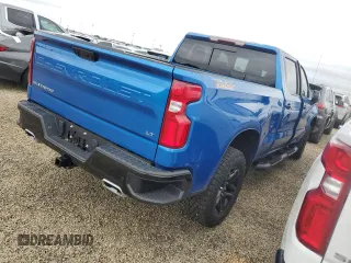 2023 Chevrolet Silverado 1500 LT Trail Boss with VIN 3GCUDFE89PG291160, listed as a Copart auction lot 74374664 with 5,757 mi miles and Salvage Title. Bid and sale history available at DreamBid. Image 3.