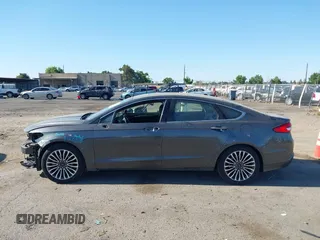2017 Ford Fusion Hybrid SE с VIN 3FA6P0LU7HR110436, выставлен на аукционе IAAI как лот 42669395 с пробегом 104 472 миль миль и . История ставок и продаж доступна на DreamBid. Изображение 15.