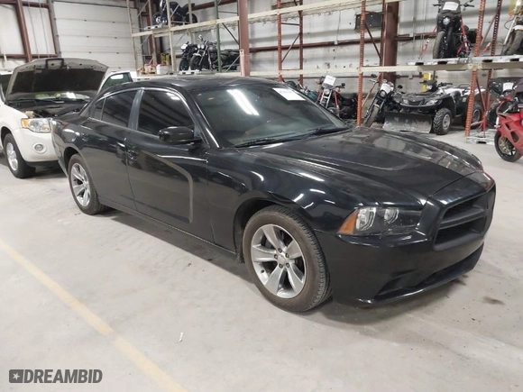 2011 Dodge Charger Road/Track with VIN 2B3CL5CT9BH511648, listed as a IAAI auction lot 42001157 with 103,223 mi miles. Bid and sale history available at carsss.com. Image 1.