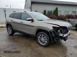 2019 Jeep Cherokee Latitude Plus with VIN 1C4PJMLN0KD384738, listed as a Copart auction lot 60099805 with 52,073 mi miles and Salvage title. Bid and sale history available at DreamBid. Image 4.