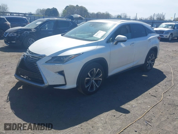 2018 Lexus RX 350 z VIN 2T2BZMCAXJC144930, wystawiony jako IAAI lot #41857778 z przebiegiem 108 191 mil mil oraz . Historia ofert i sprzedaży dostępna na DreamBid. Obrazek 19.