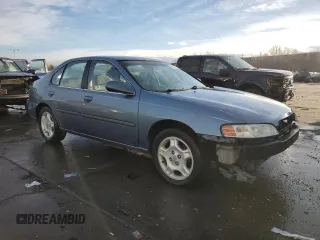 2000 Nissan Altima XE with VIN 1N4DL01D2YC140903, listed as a Copart auction lot 85961404 with 236,639 mi miles and Salvage Title. Bid and sale history available at carsss.com. Image 4.