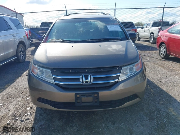 2012 Honda Odyssey LX with VIN 5FNRL5H29CB091860, listed as a IAAI auction lot 42000688 with 295,551 mi miles. Bid and sale history available at carsss.com. Image 6.