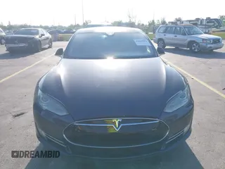 2015 Tesla Model S 85D with VIN 5YJSA1H46FF082264, listed as a IAAI auction lot 42068959 with 98,693 mi miles. Bid and sale history available at carsss.com. Image 12.