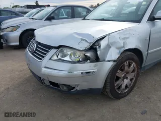 2003 Volkswagen Passat GLX with VIN WVWYH63B73E462624, listed as a IAAI auction lot 41555785 with 166,521 mi miles. Bid and sale history available at carsss.com. Image 6.