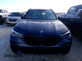 2022 BMW X5 sDrive40i with VIN 5UXCR4C08N9M98312, listed as a Copart auction lot 69814452 with 2,495 mi miles. Bid and sale history available at carsss.com. Image 5.