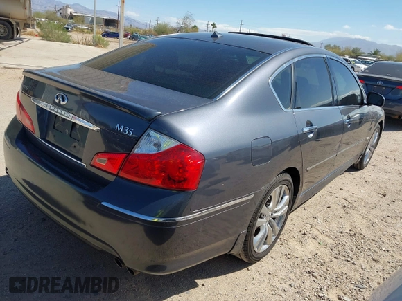 2010 Infiniti M with VIN JN1CY0AP0AM911640, listed as a IAAI auction lot 41549869 with 153,445 mi miles. Bid and sale history available at carsss.com. Image 4.