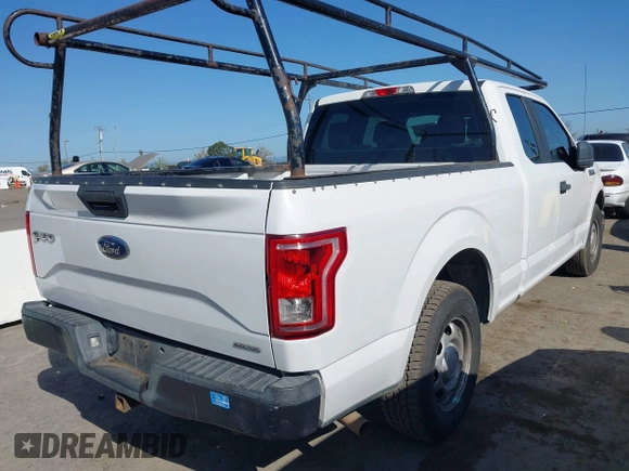 2015 Ford F-150 XL with VIN 1FTEX1C89FFC78555, listed as a IAAI auction lot 41989102 with 216,655 mi miles. Bid and sale history available at carsss.com. Image 4.