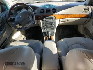 2001 Chrysler LHS z VIN 2C3AC56GX1H547856, wystawiony jako Copart lot #77842124 z przebiegiem 97 378 mil mil oraz Tytuł czysty. Historia ofert i sprzedaży dostępna na DreamBid. Obrazek 8.