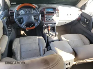 2005 Mitsubishi Montero Limited z VIN JA4MW51S65J000349, wystawiony jako Copart lot #77456554 z przebiegiem 173 334 mil mil oraz Szkoda całkowita • Salvage title. Historia ofert i sprzedaży dostępna na DreamBid. Obrazek 8.
