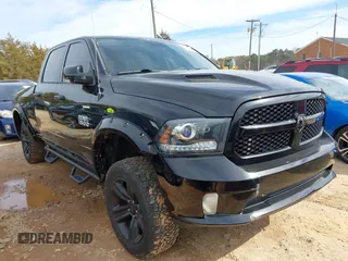 2014 Ram 1500 Sport z VIN 1C6RR7UT7ES194099, wystawiony jako IAAI lot #41613670 z przebiegiem 124 624 mil mil oraz . Historia ofert i sprzedaży dostępna na DreamBid. Obrazek 1.