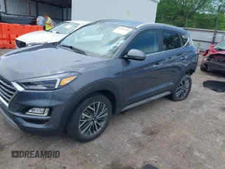 2021 Hyundai Tucson SEL z VIN KM8J33AL2MU325832, wystawiony jako IAAI lot #42153724 z przebiegiem 73 799 mil mil oraz . Historia ofert i sprzedaży dostępna na DreamBid. Obrazek 2.