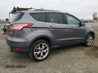 2013 Ford Escape Titanium with VIN 1FMCU0J91DUC35855, listed as a Copart auction lot 55986955 with 159,790 mi miles and Salvage title. Bid and sale history available at DreamBid. Image 3.