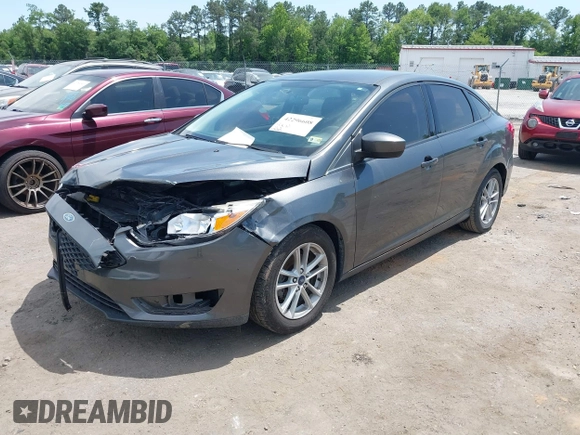 2018 Ford Focus SE with VIN 1FADP3FE2JL227679, listed as a IAAI auction lot 42296608 with 128,269 mi miles and . Bid and sale history available at DreamBid. Image 17.