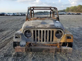 2004 Jeep Wrangler Rubicon with VIN 1J4FA69S54P710341, listed as a Copart auction lot 51749175 with Not provided miles and Non repairable. Bid and sale history available at DreamBid. Image 5.