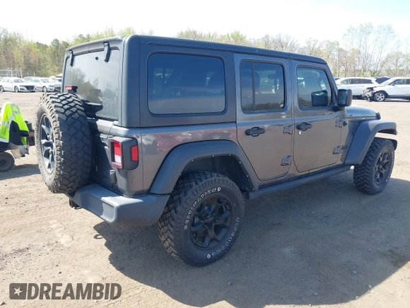 2021 Jeep Wrangler Unlimited Willys with VIN 1C4HJXDG1MW672507, listed as a IAAI auction lot 42084805 with 59,943 mi miles and . Bid and sale history available at DreamBid. Image 4.
