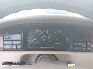 1993 Cadillac Seville STS z VIN 1G6KY5298PU821640, wystawiony jako IAAI lot #42269233 z przebiegiem 126 662 mil mil oraz . Historia ofert i sprzedaży dostępna na DreamBid. Obrazek 7.