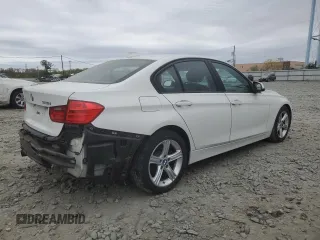 2013 BMW 3 Series 328i with VIN WBA3C1G5XDNR45104, listed as a Copart auction lot 54140965 with 138,283 mi miles and Clean Title. Bid and sale history available at carsss.com. Image 3.