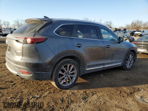 2020 Mazda CX-9 Grand Touring with VIN JM3TCADY1L0415978, listed as a Copart auction lot 42561205 with 72,667 mi miles and Salvage title. Bid and sale history available at DreamBid. Image 3.