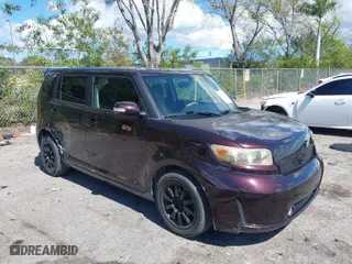 2008 Scion xB with VIN JTLKE50E981035889, listed as a IAAI auction lot 41688094 with 145,917 mi miles. Bid and sale history available at carsss.com. Image 1.