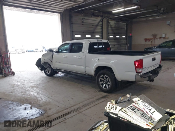 2016 Toyota Tacoma SR5 with VIN 3TMDZ5BN2GM007990, listed as a IAAI auction lot 41288736 with 76,179 mi miles. Bid and sale history available at carsss.com. Image 3.