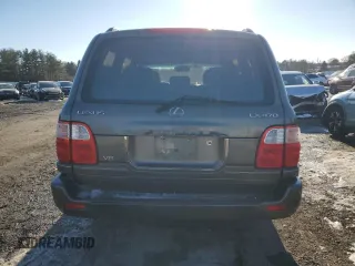 2000 Lexus LX 470 z VIN JT6HT00W1Y0084900, wystawiony jako Copart lot #41480235 z przebiegiem 213 577 mil mil oraz Szkoda całkowita • Salvage title. Historia ofert i sprzedaży dostępna na DreamBid. Obrazek 6.