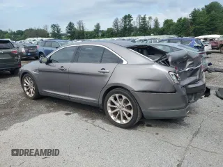 2014 Ford Taurus Limited with VIN 1FAHP2F88EG102674, listed as a Copart auction lot 62841285 with 107,378 mi miles and Salvage title. Bid and sale history available at DreamBid. Image 2.