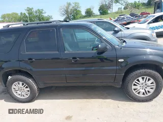 2006 Mercury Mariner Convenience with VIN 4M2YU56Z66KJ04591, listed as a IAAI auction lot 42469116 with 174,952 mi miles and . Bid and sale history available at DreamBid. Image 14.
