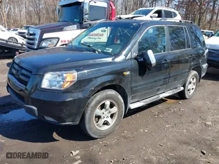 2008 Honda Pilot SE with VIN 5FNYF18338B000366, listed as a IAAI auction lot 41857228 with 217,246 mi miles. Bid and sale history available at carsss.com. Image 2.