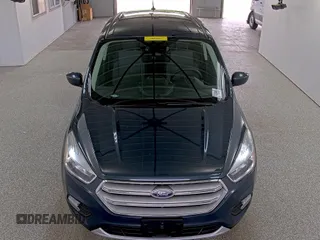 2019 Ford Escape SE z VIN 1FMCU9GD9KUA54757, wystawiony jako IAAI lot #42516631 z przebiegiem 87 040 mil mil oraz . Historia ofert i sprzedaży dostępna na DreamBid. Obrazek 25.
