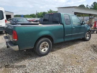 1999 Ford F-150 с VIN 1FTZX1723XNB11655, выставлен на аукционе Copart как лот 57573695 с пробегом Не указан миль и Списание • Salvage title. История ставок и продаж доступна на DreamBid. Изображение 3.
