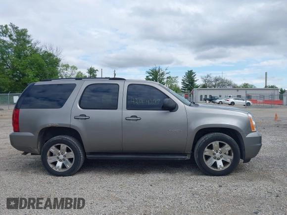 2007 GMC Yukon SLT z VIN 1GKFK13077R129885, wystawiony jako IAAI lot #42184207 z przebiegiem 264 848 mil mil oraz . Historia ofert i sprzedaży dostępna na DreamBid. Obrazek 13.