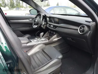 2020 Alfa Romeo Stelvio Ti with VIN ZASPAKBNXL7C75314, listed as a IAAI auction lot 41742922 with 34,620 mi miles. Bid and sale history available at carsss.com. Image 5.